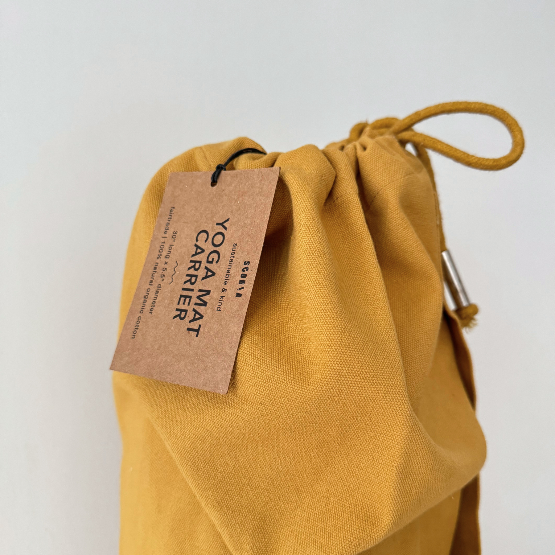Scoria Yoga Mat Bag Organic Cotton with Adjustable Straps Sustainable Fairtrade and Ethical Amber Gold Yellow Close Up Gives Back